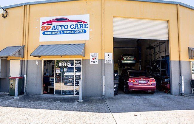SP Auto Care shopfront at unit 5, roller door open